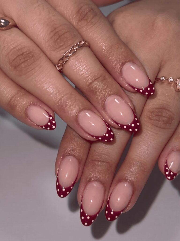 Burgundy French tip nails with polka dot art at Ivory Nail Boutique, Victoria