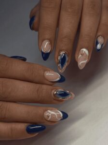 Navy blue and gold leaf luxury nail design at Ivory Nail Boutique, Victoria BC