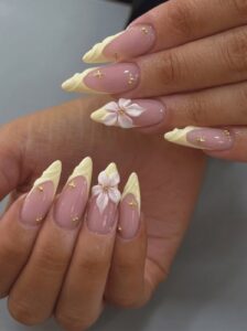 Pastel yellow ruffle French nails with gold accents at Ivory Nail Boutique, Victoria BC