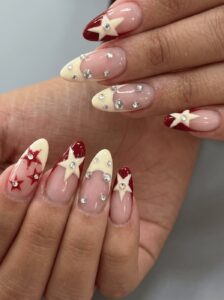Red and cream French nails with star nail art at Ivory Nail Boutique, Victoria